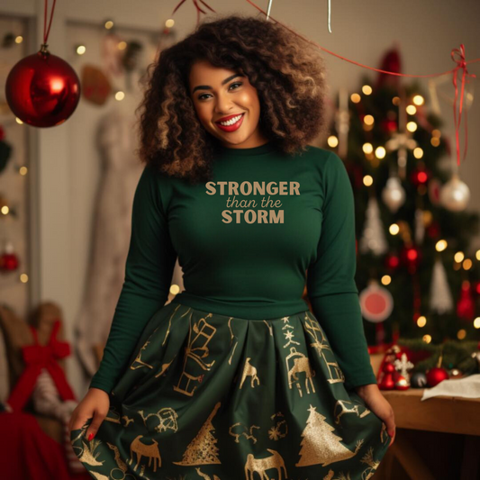 STRONGER THAN THE STORM LADIES LONG SLEEVE GREEN TEE